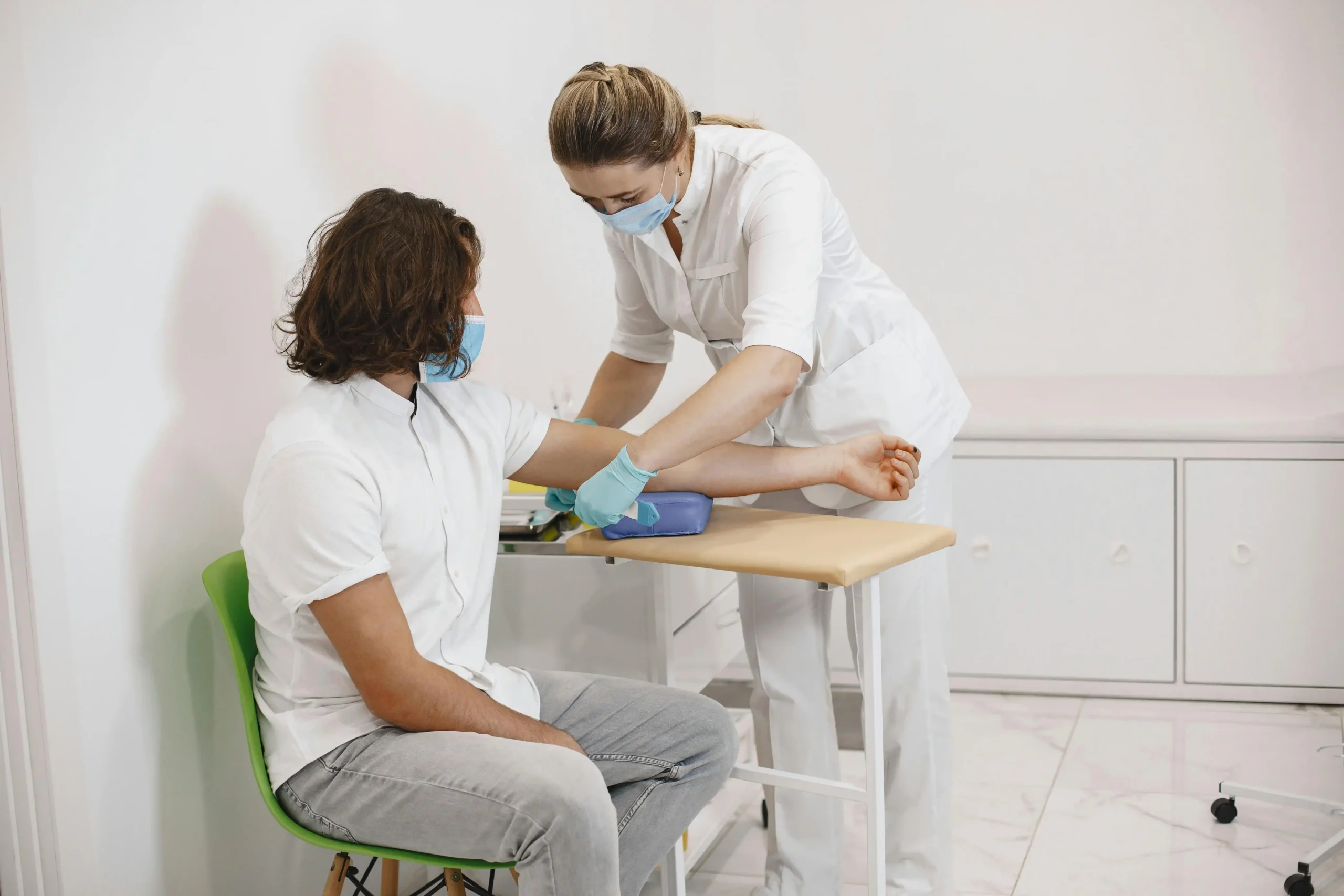 Patient undergoing blood testing during a Marek Health consultation for hormone optimization.