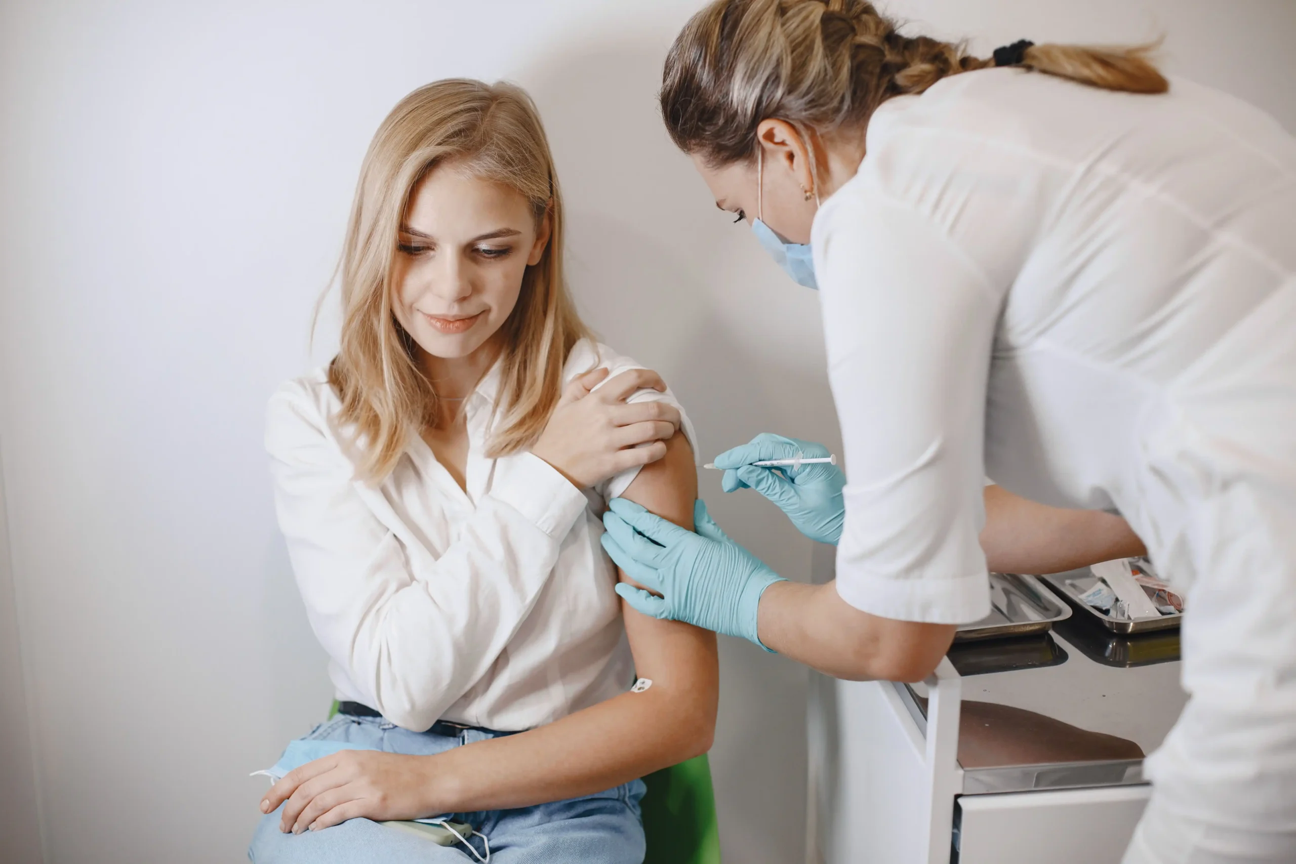 Woman receiving a medical injection as part of testosterone therapy for women.