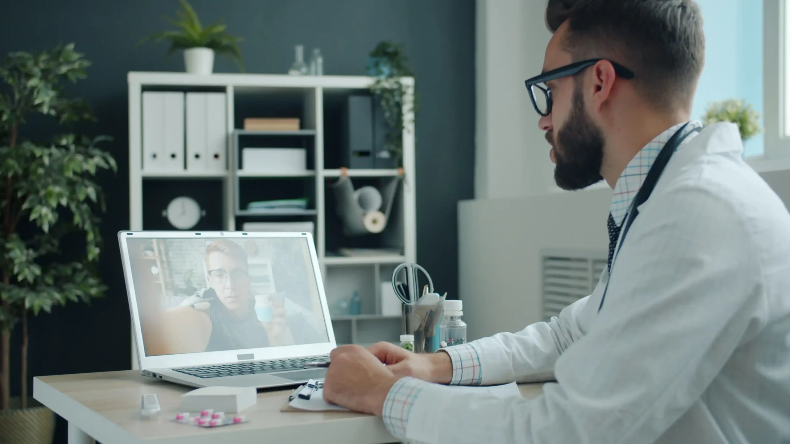 Man having an online TRT consultation with his doctor to discuss his TRT results timeline.
